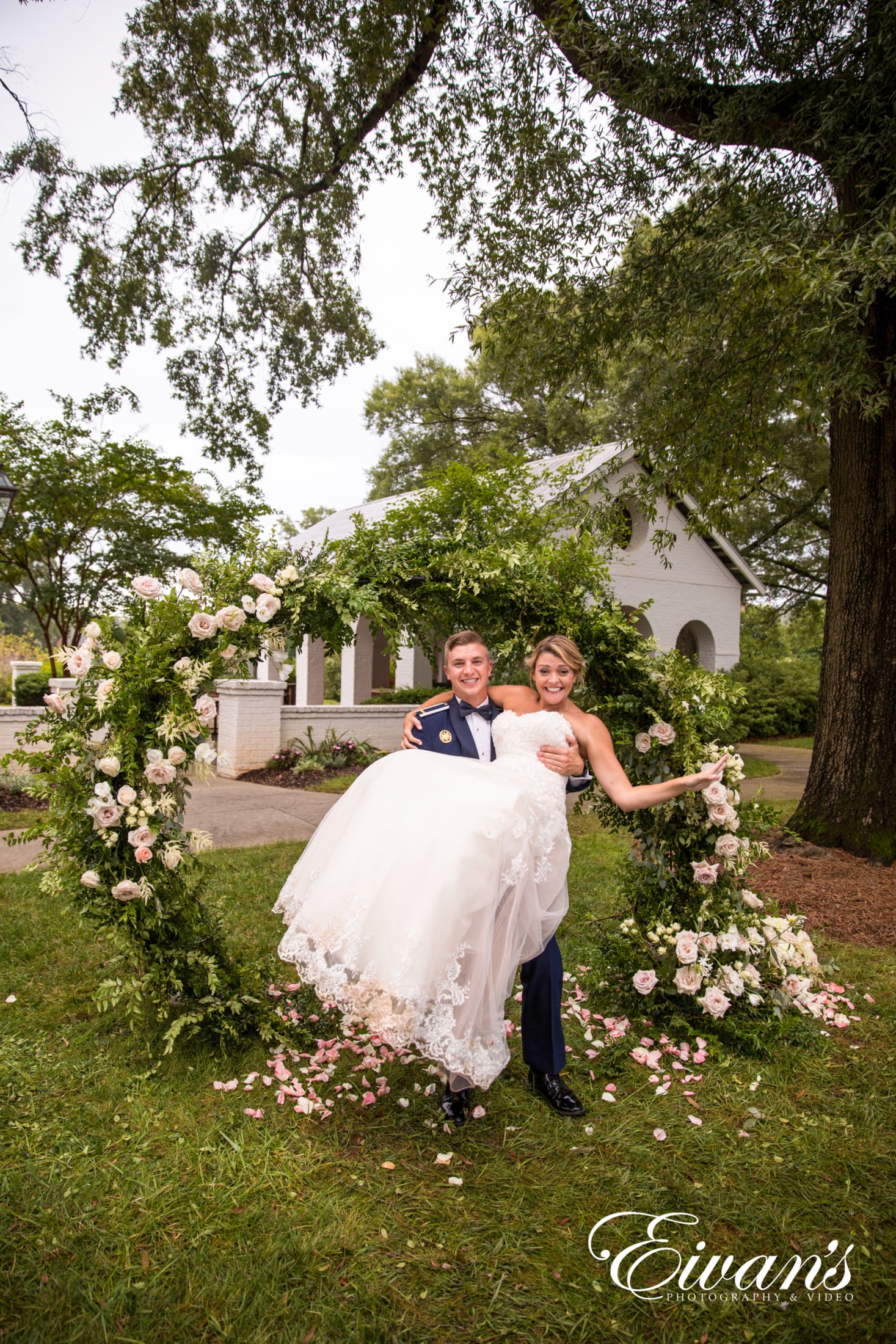 image of a bride and groom walking through the alter