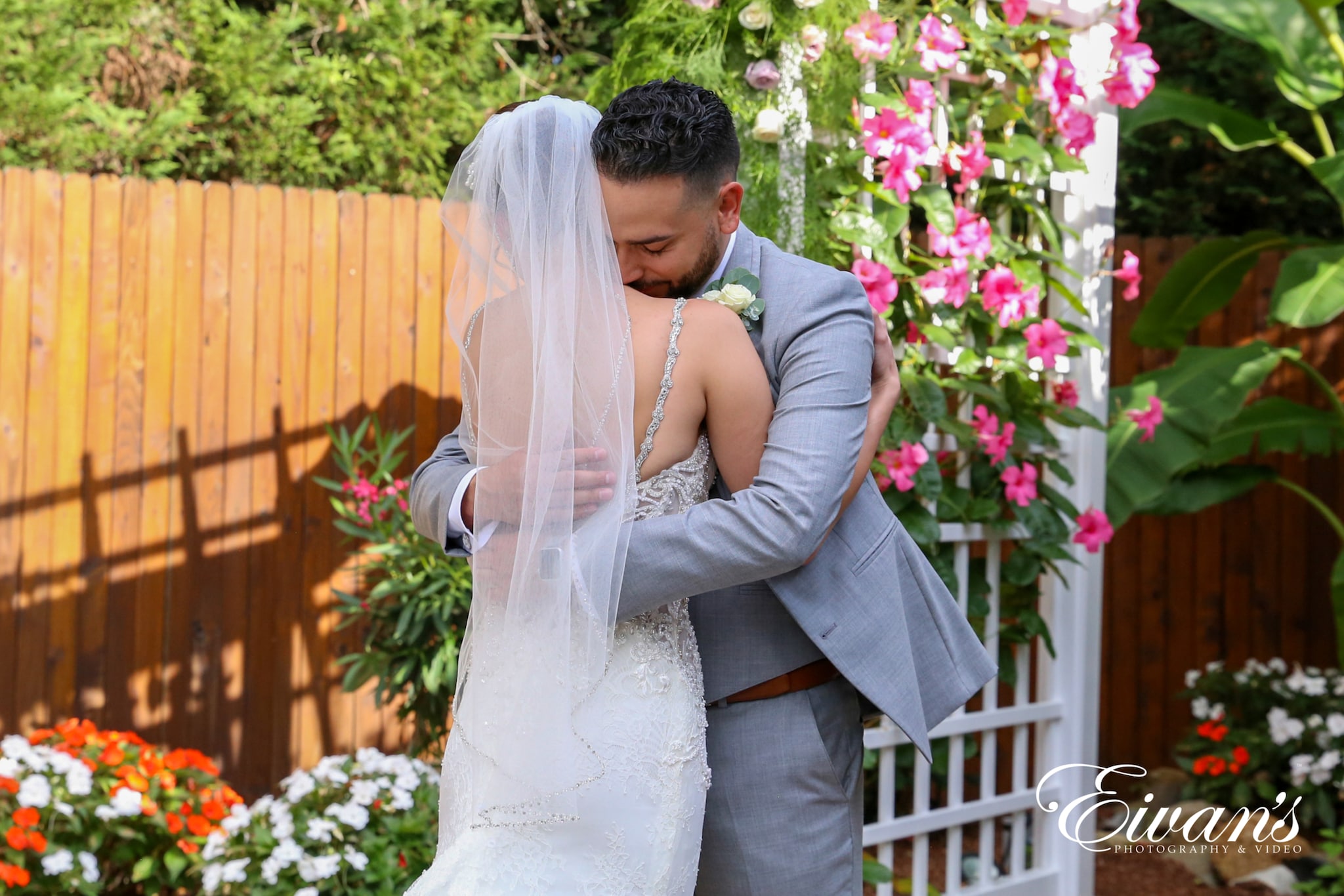 image of married couple hugging at the alter