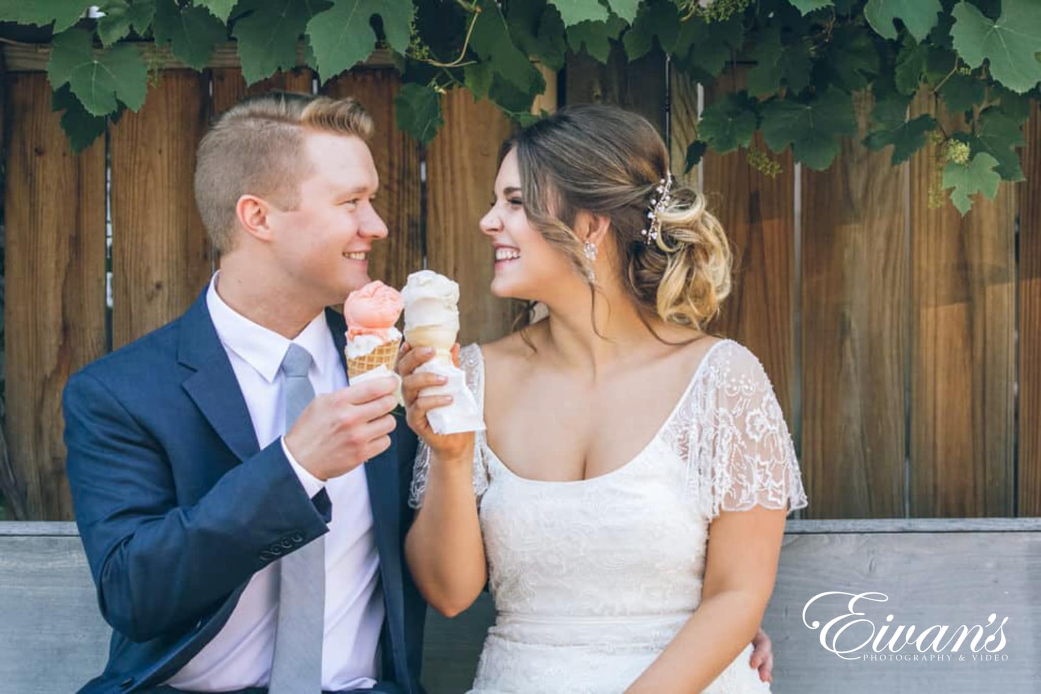 image of a bride and groom cheering to ice cream