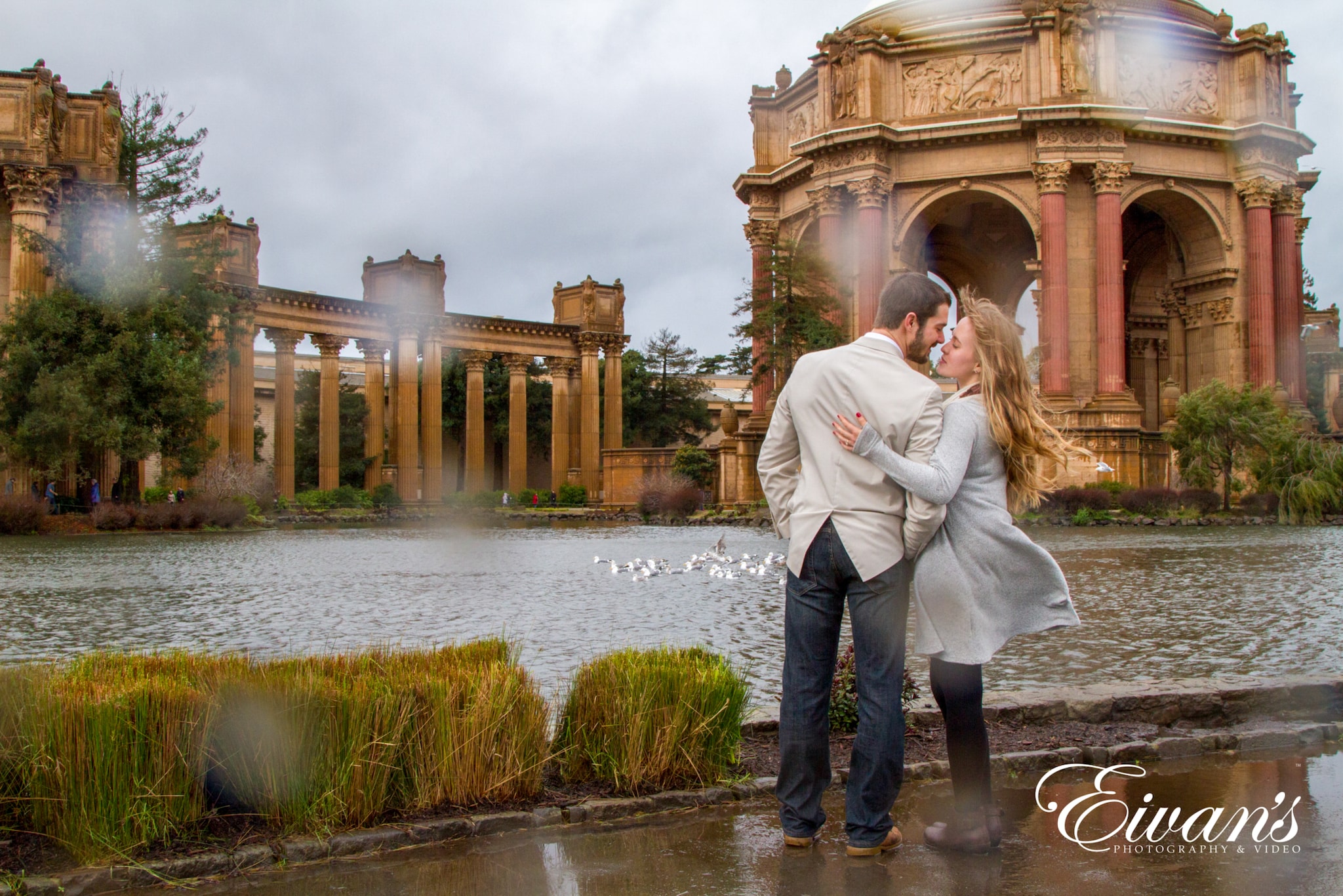 image of an engaged couple in the rain