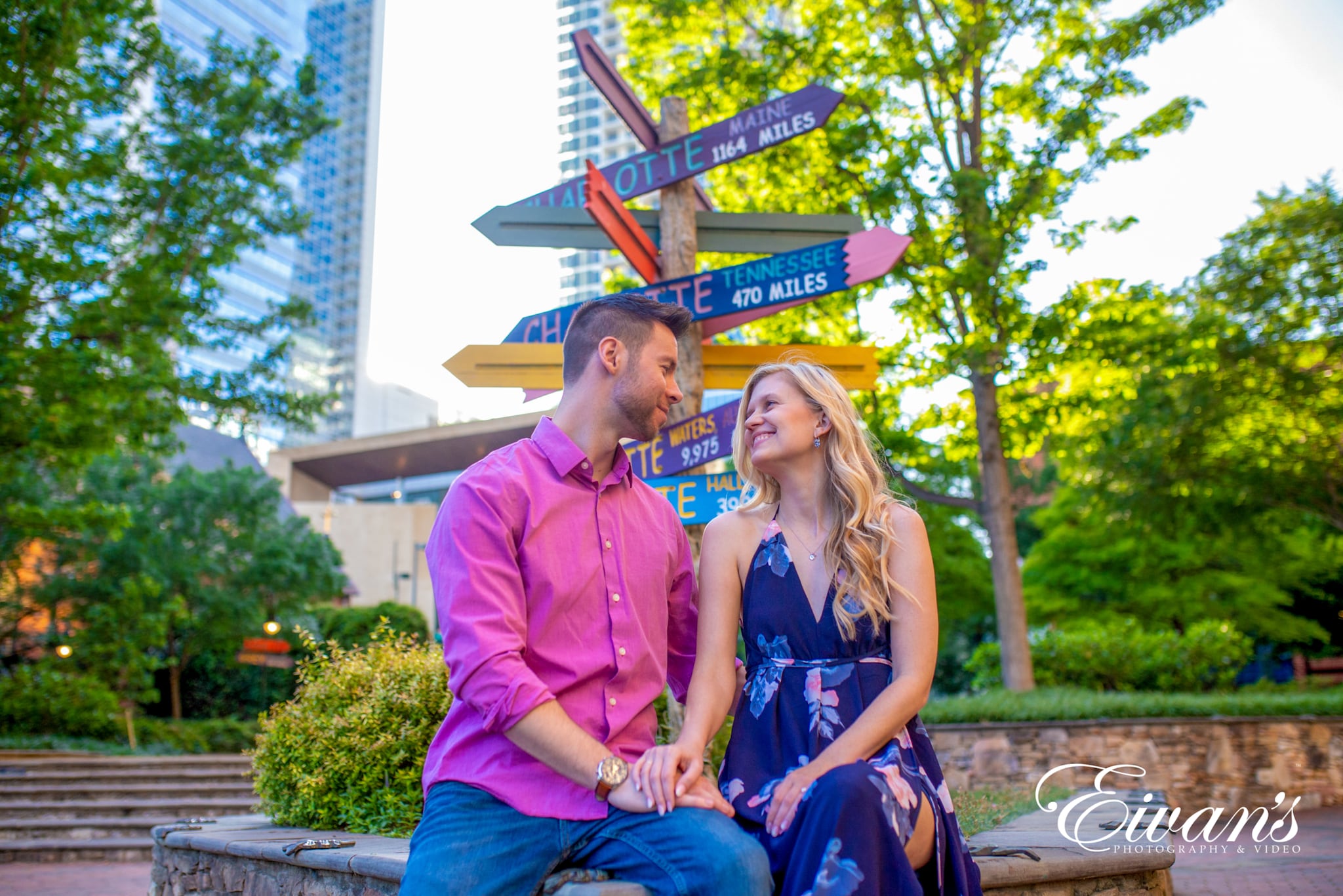 image of engaged couple in the park