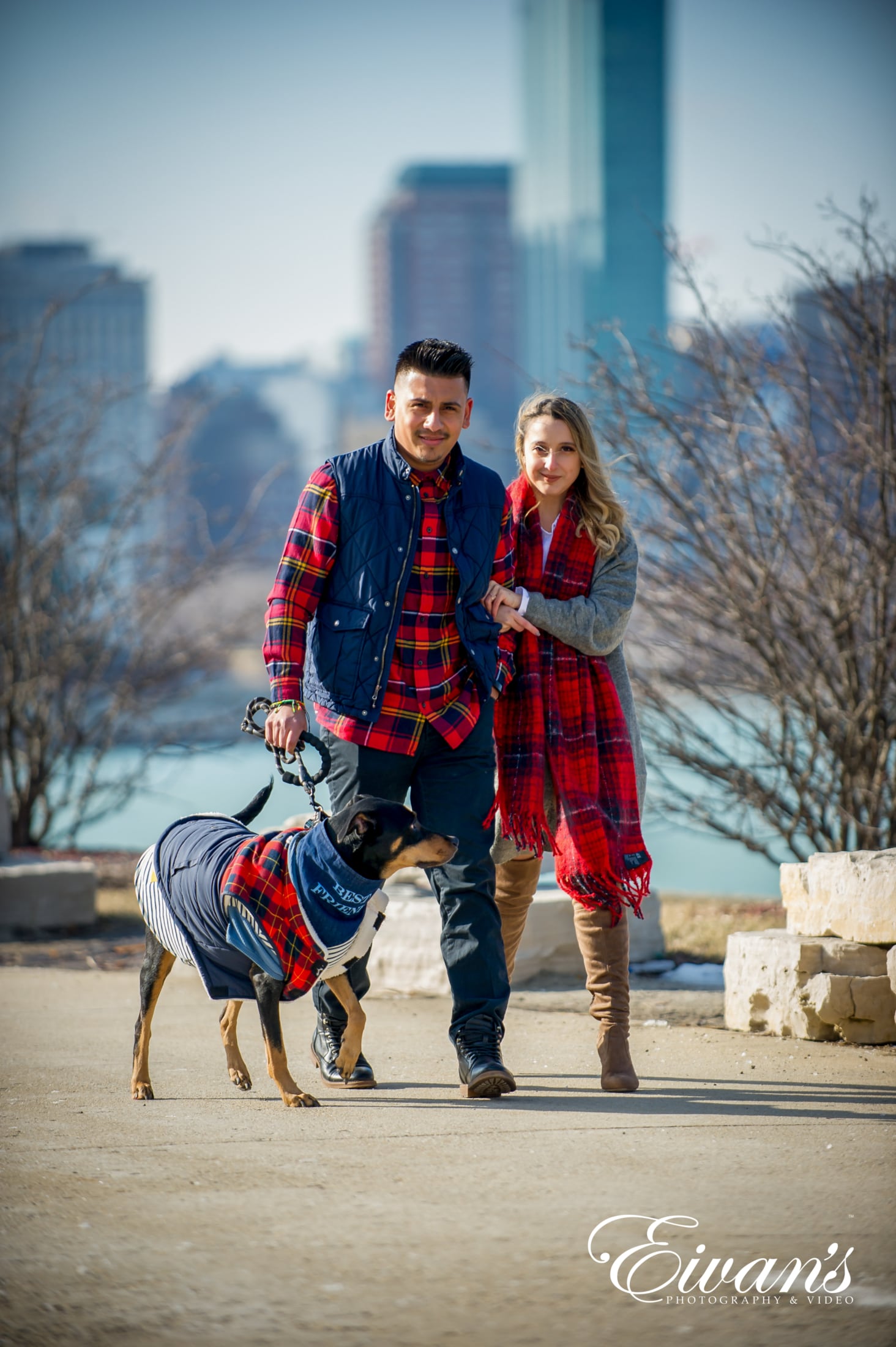 unique-engagement-photos image of a couple walking their dog