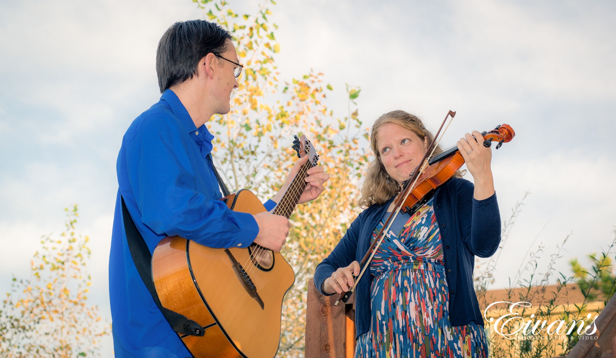 cute-engagement-photos image of a couple playing instruments