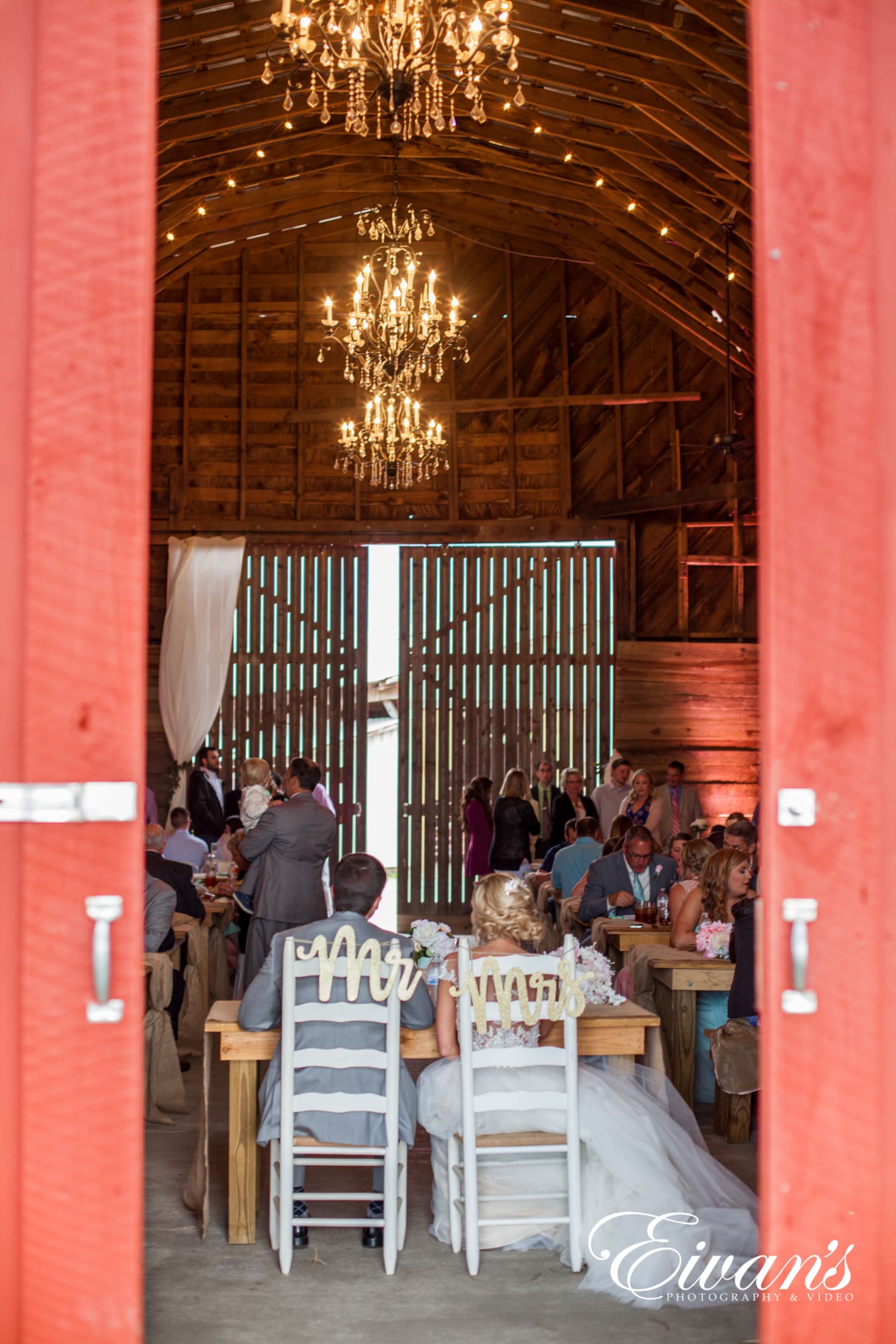 indoor-wedding-photos-barn image of a married couple at their barn wedding venue