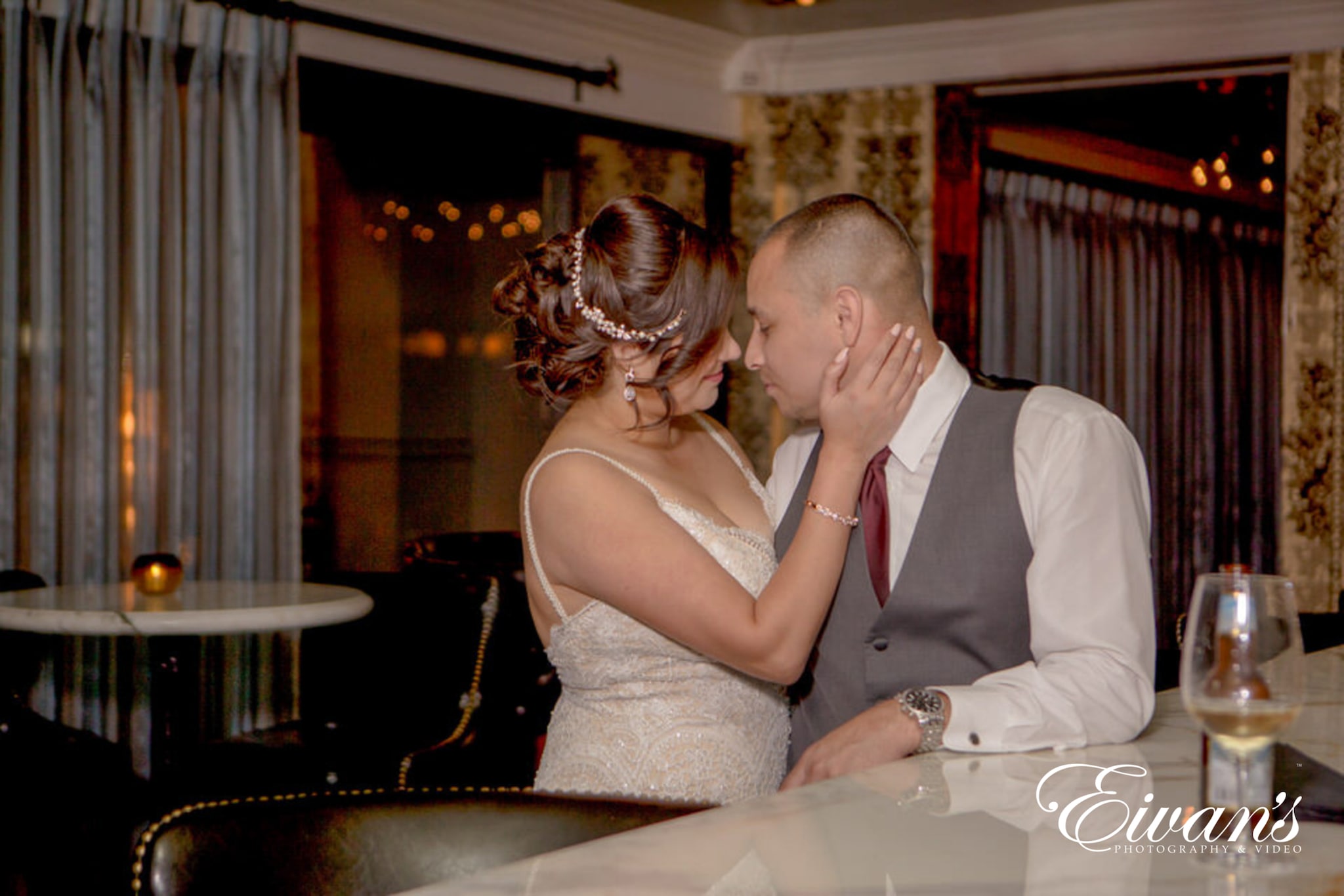 image of a married couple kissing at the casino bar