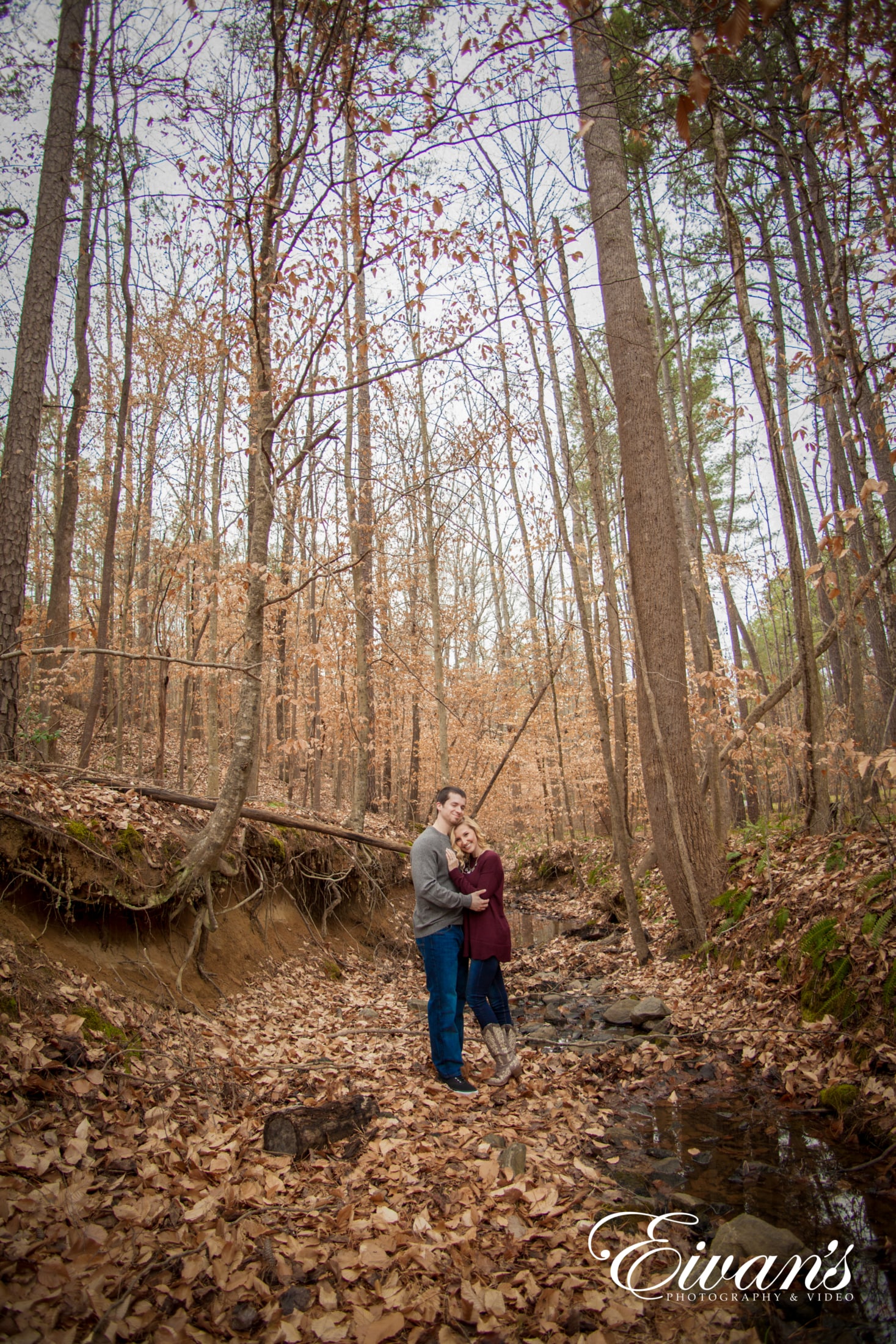 unique-engagement-photos image of couple in the woods