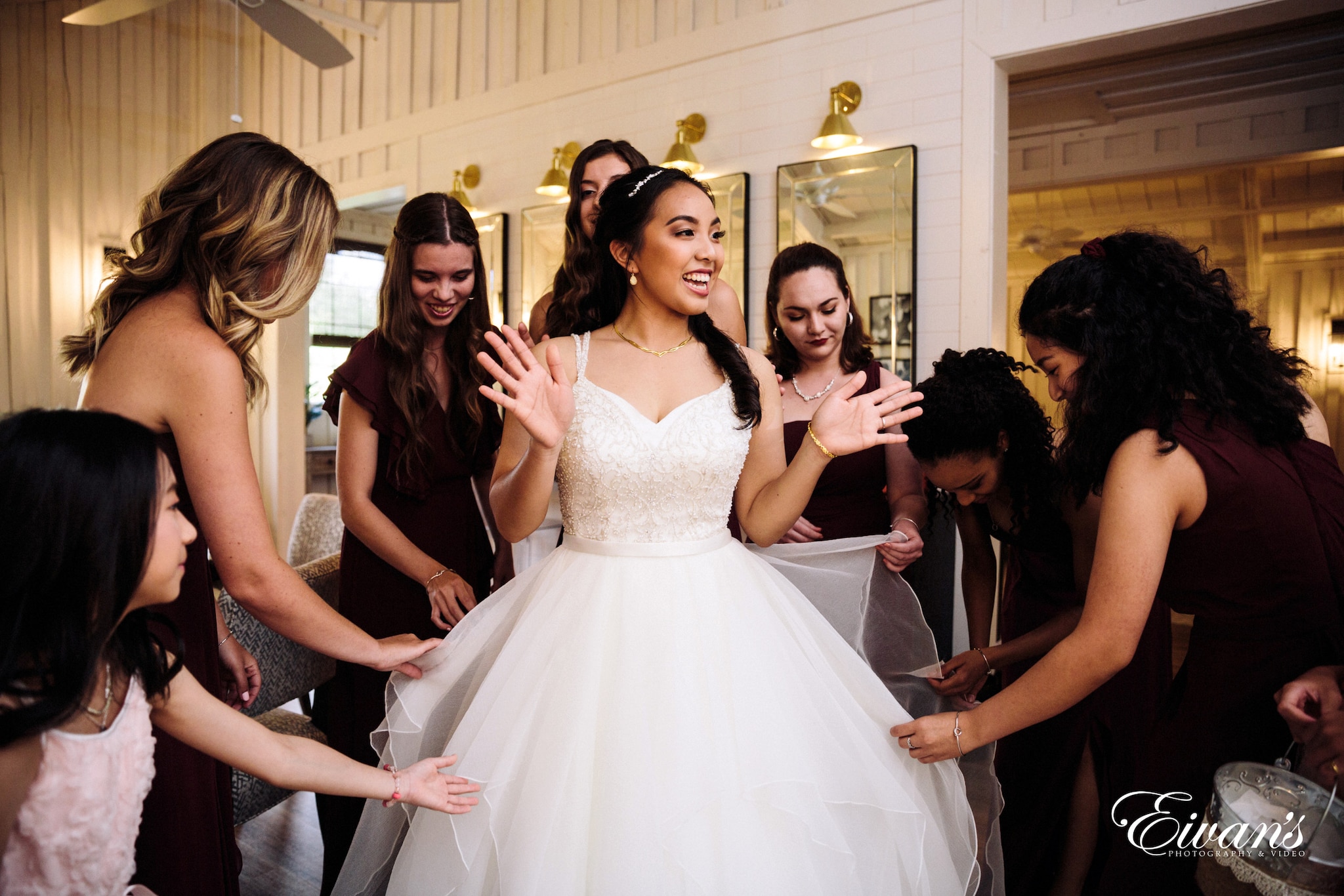 smiling bride with bridesmaid