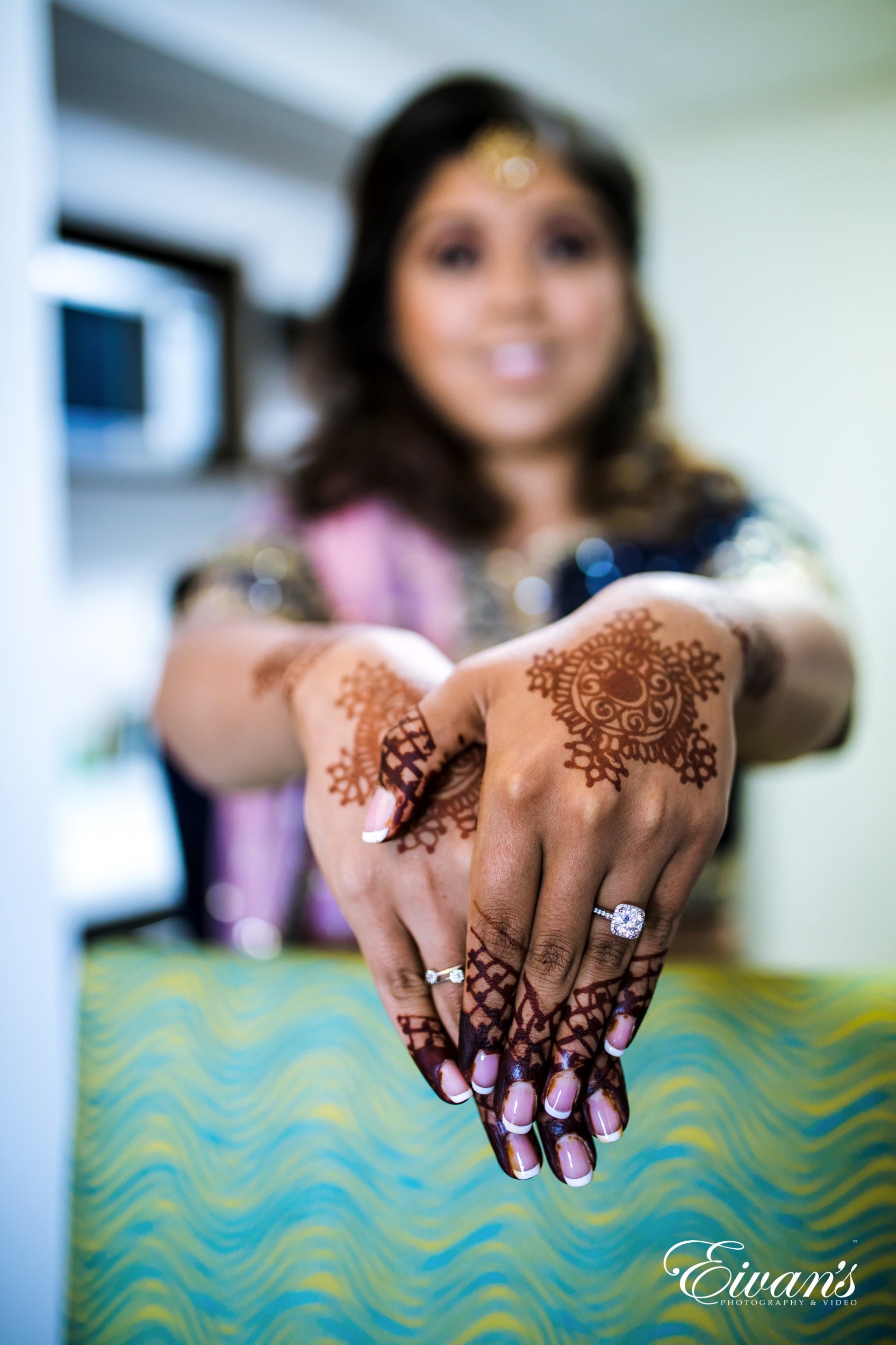 woman with black and white manicure