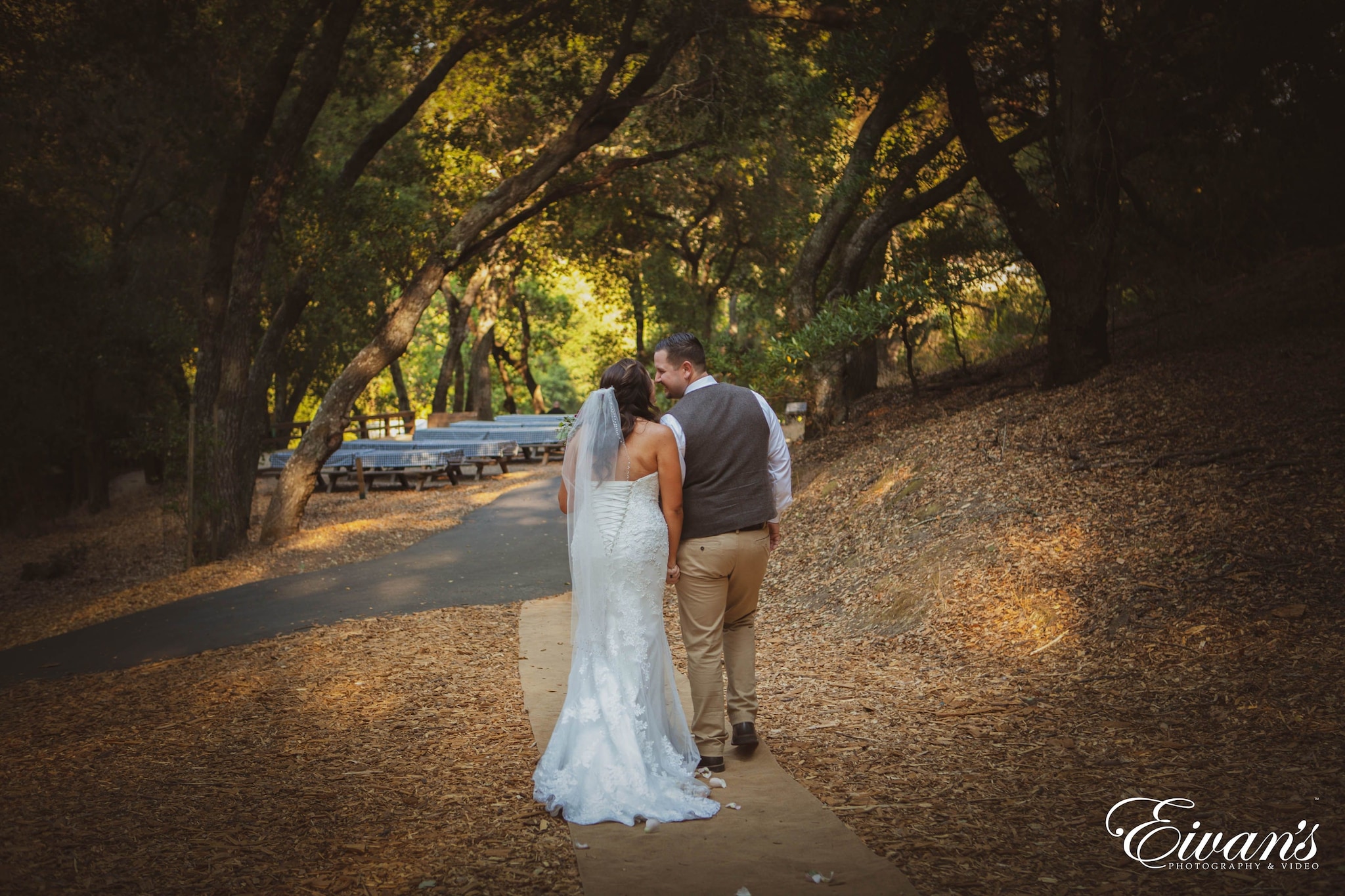 man and woman kissing on road during daytime