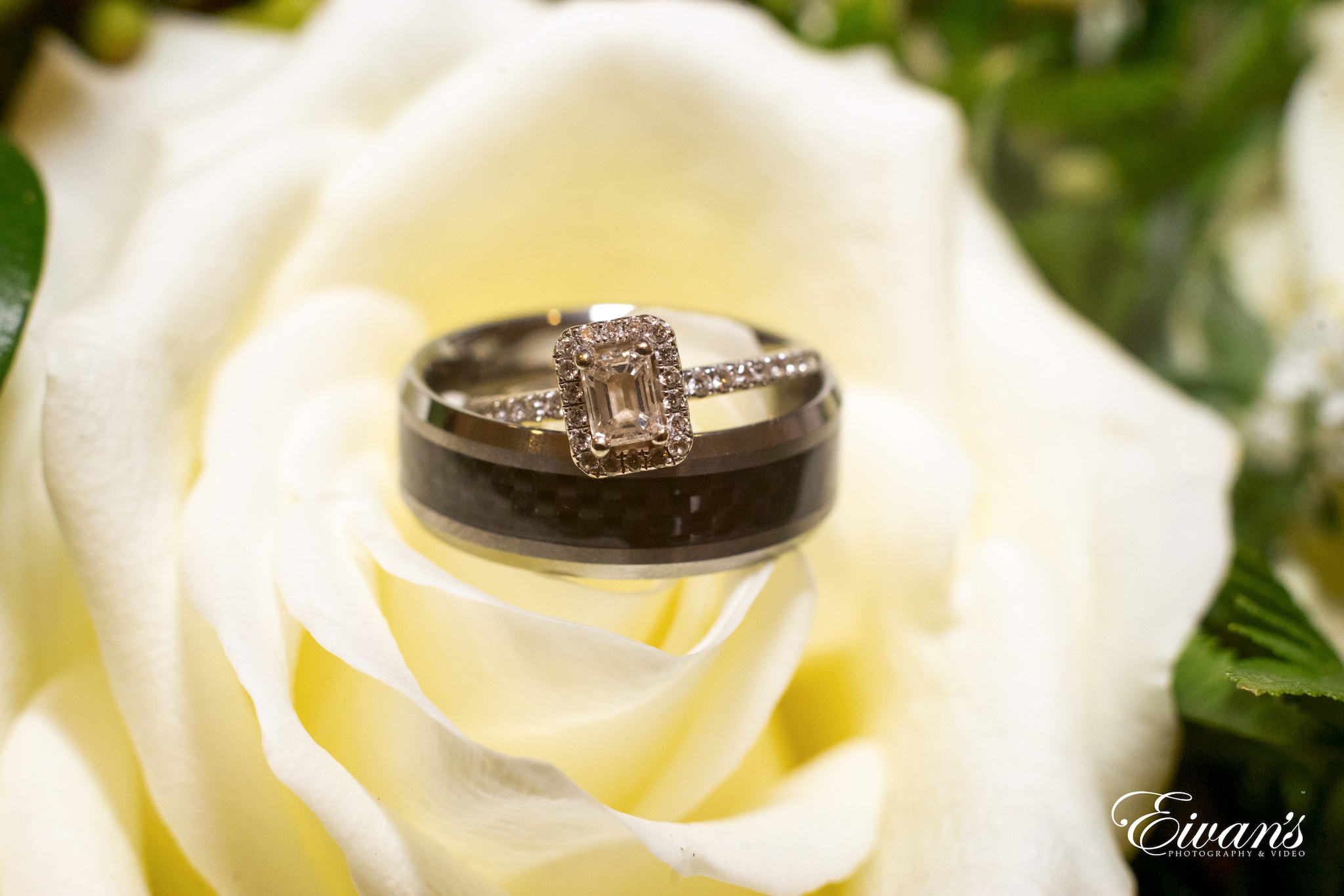 silver diamond ring on white flower