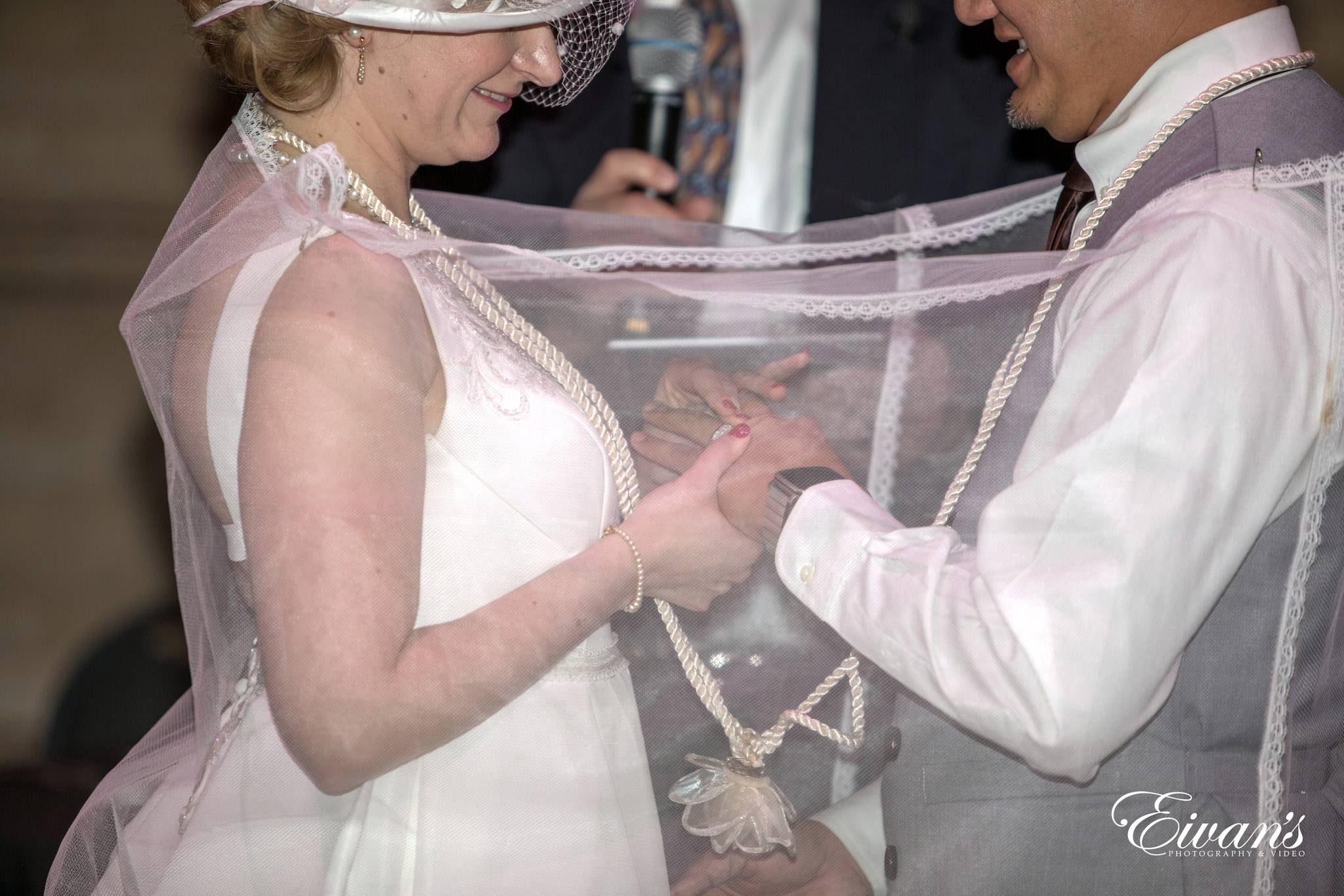 woman in white sleeveless dress wearing white hat