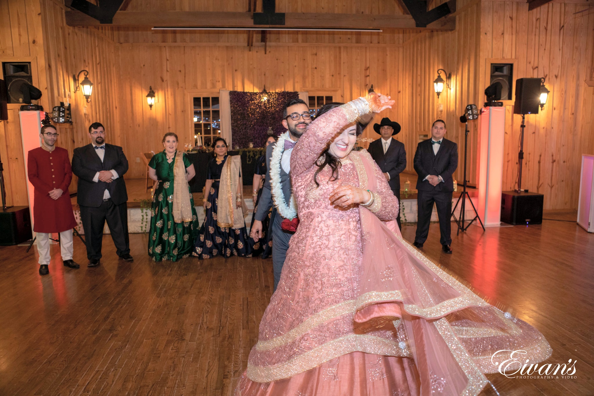 woman in pink dress dancing on brown wooden floor