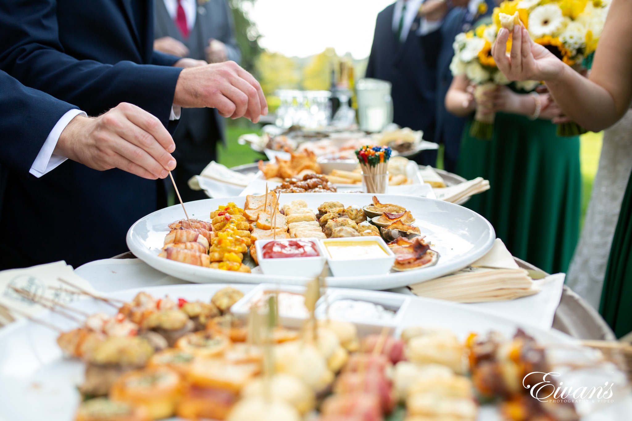 person holding stainless steel fork and knife slicing food on white ceramic plate