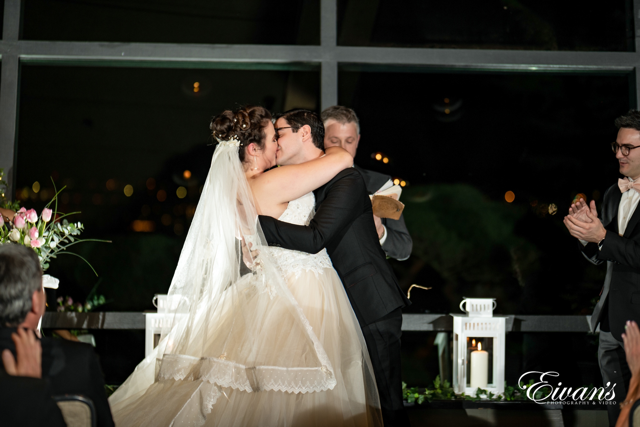 man and woman kissing each other