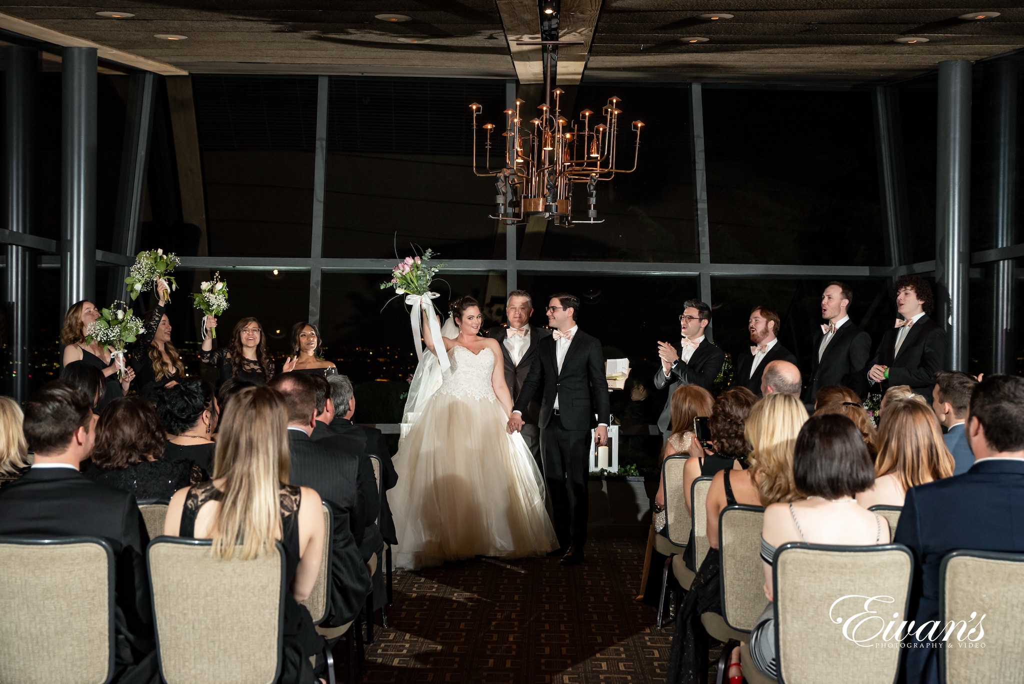 bride and groom sitting on chair