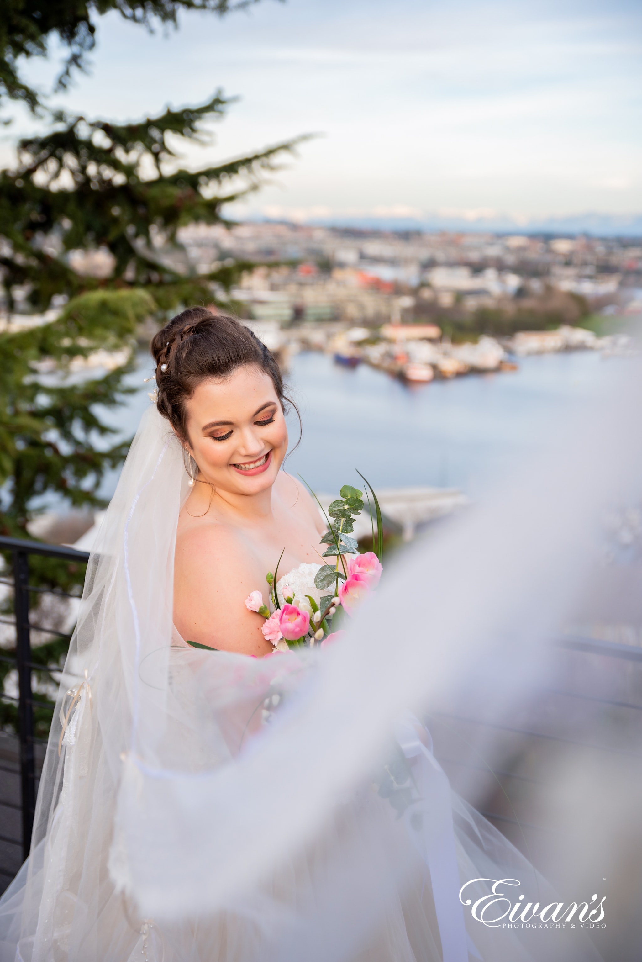 woman in white wedding dress holding bouquet of flowers