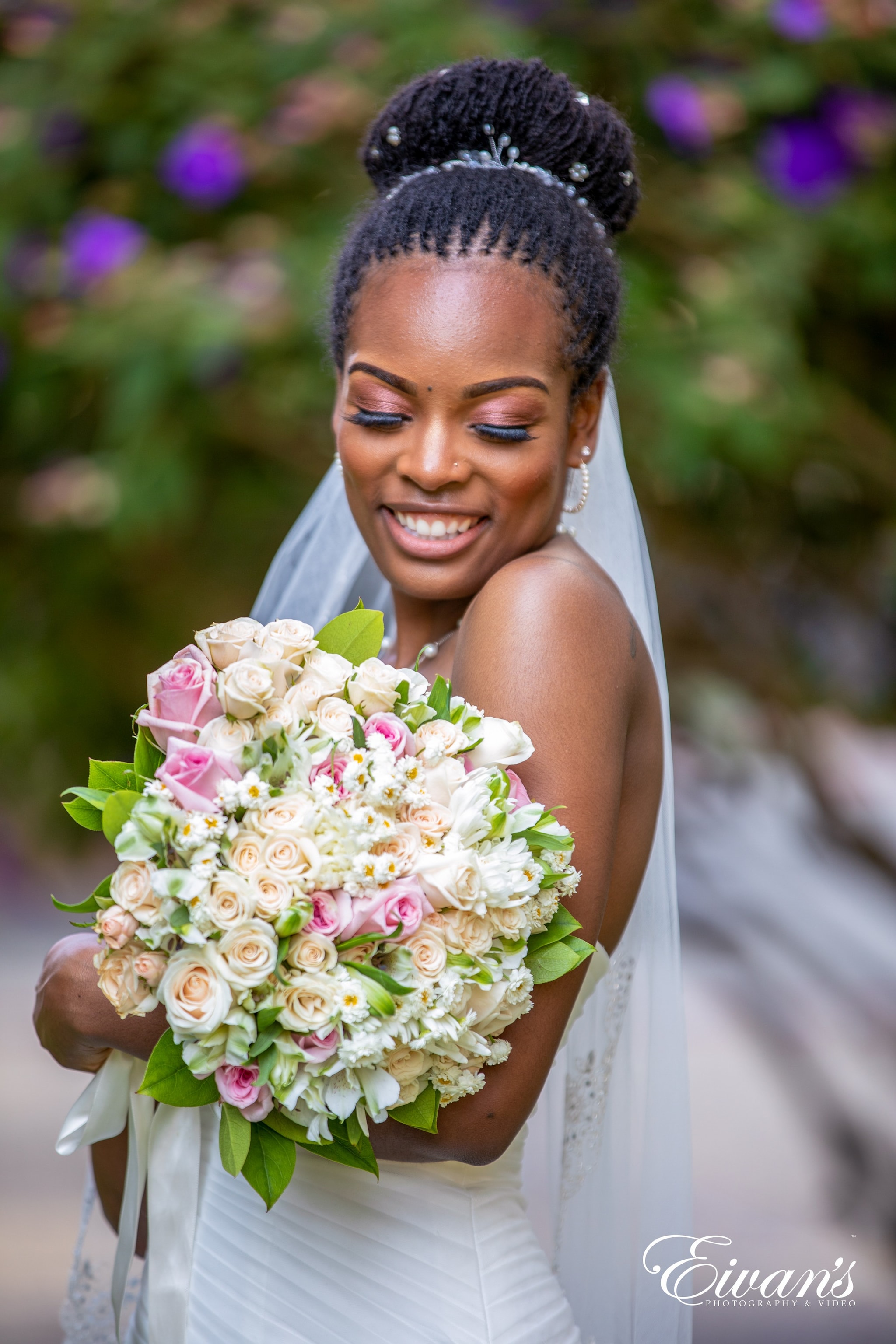 woman in white sleeveless dress holding bouquet of flowers
