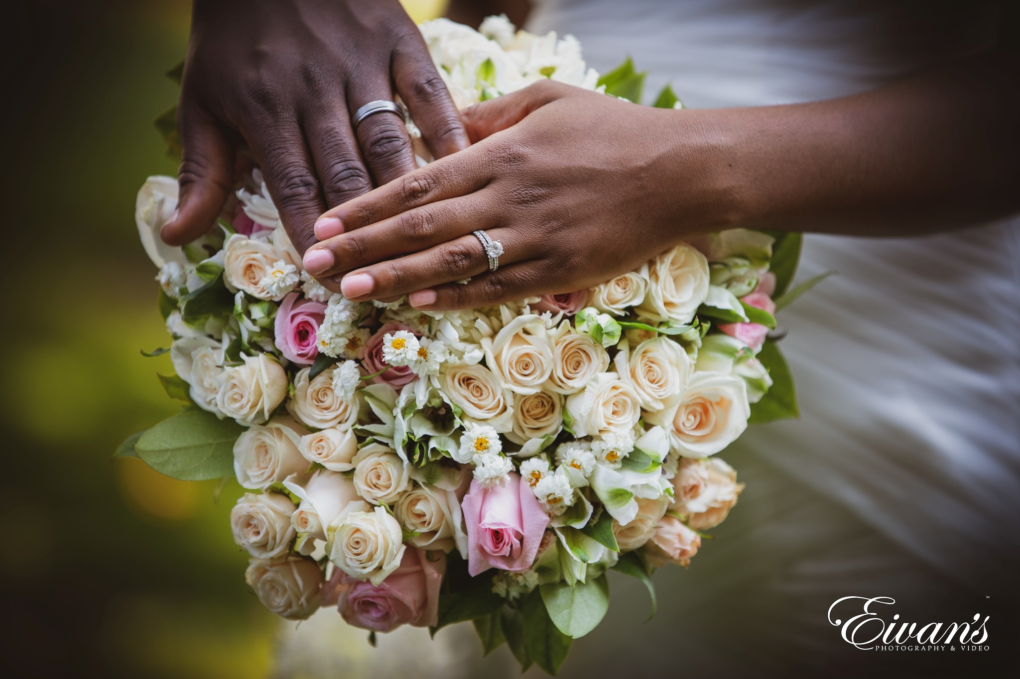 person wearing gold wedding ring
