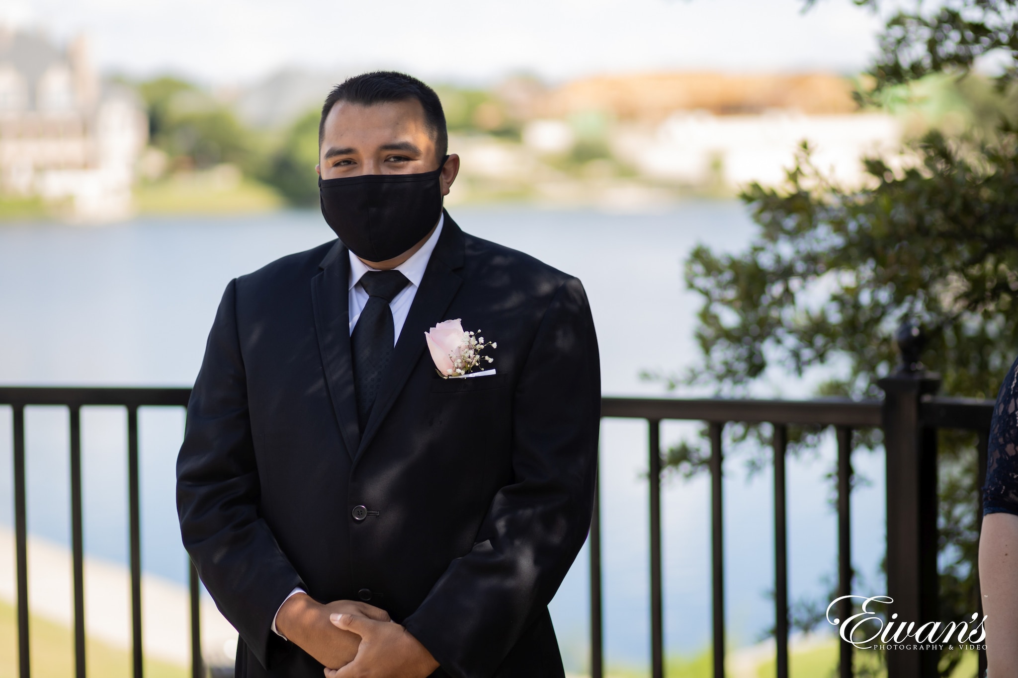 man in black suit jacket wearing black