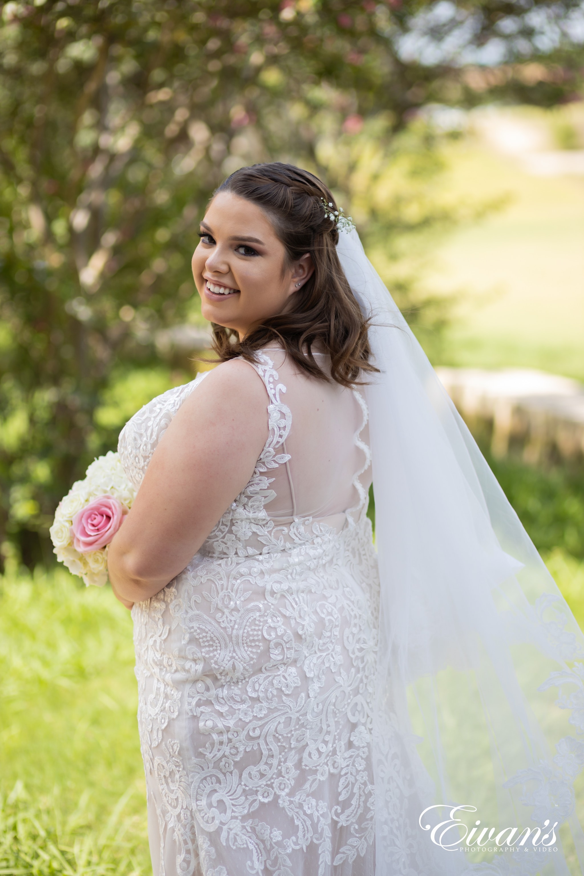 woman in white floral sleeveless dress