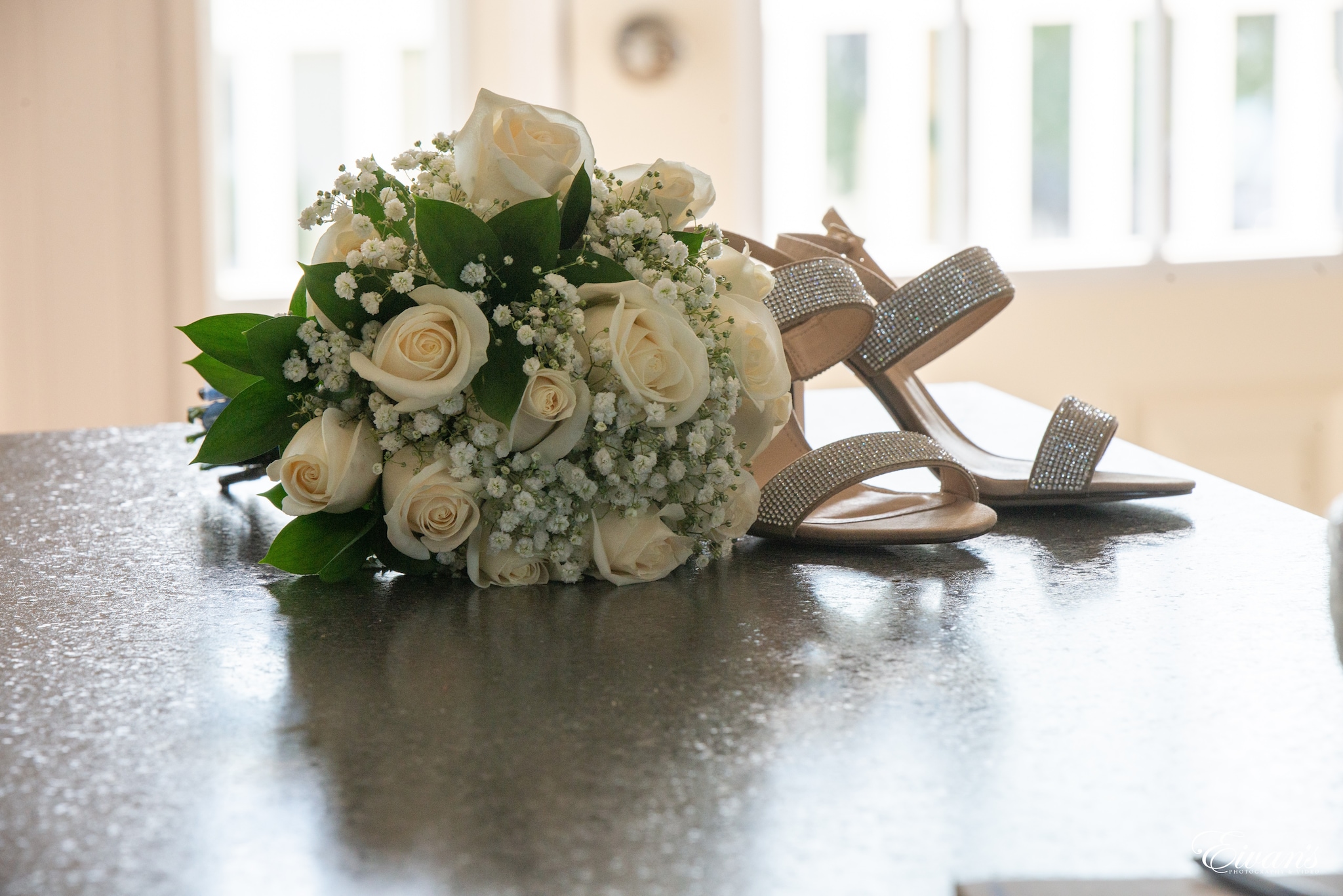 white and green floral bouquet on table