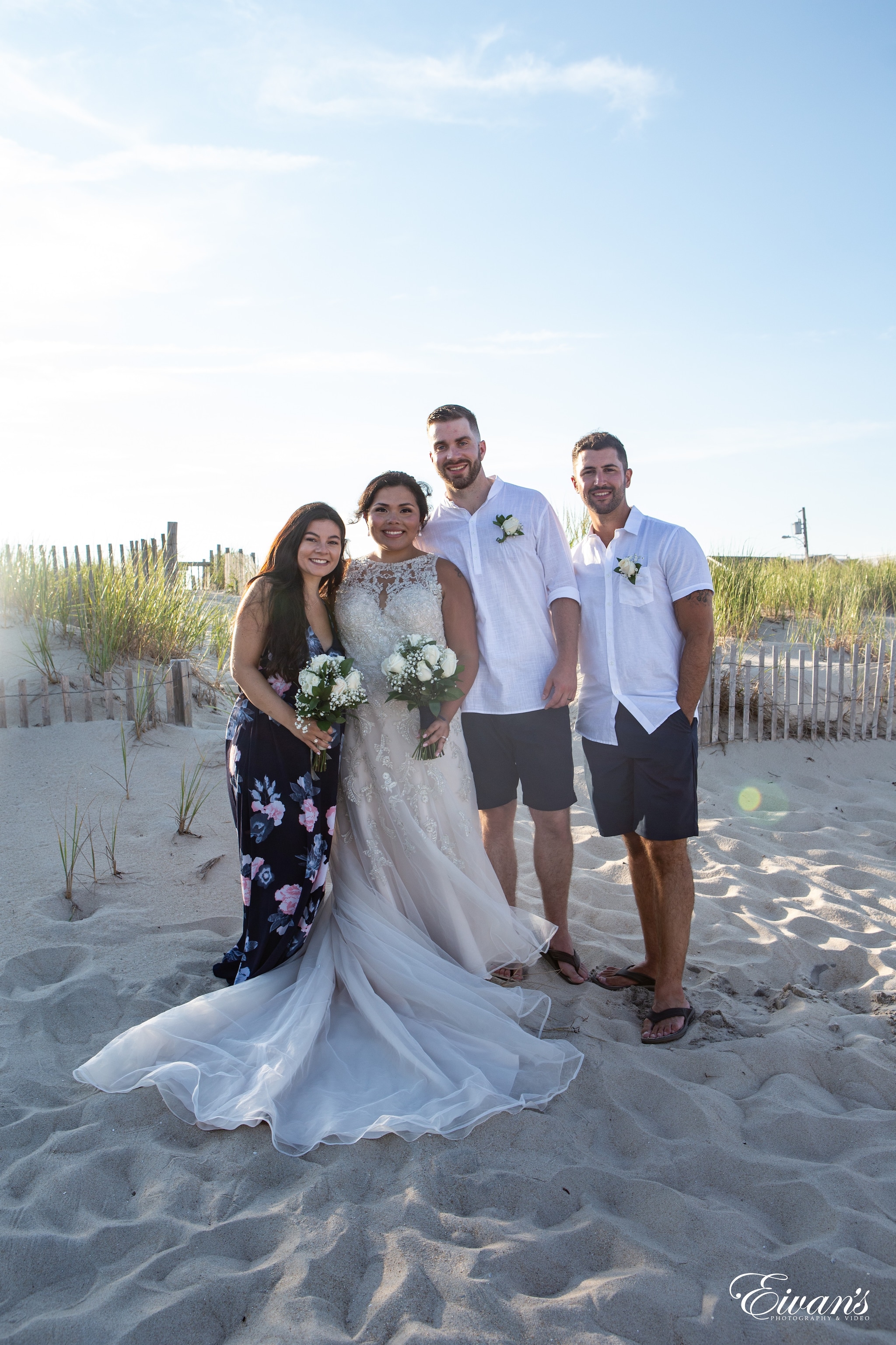 man in white dress shirt beside woman in white wedding dress