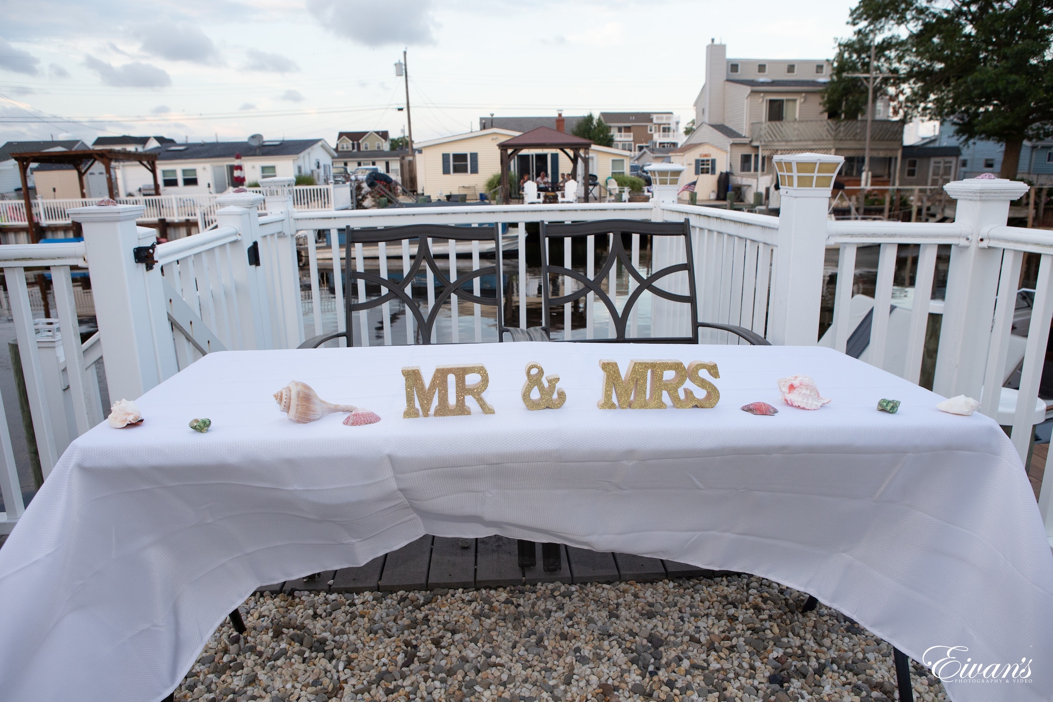 white and red boat on white boat dock during daytime
