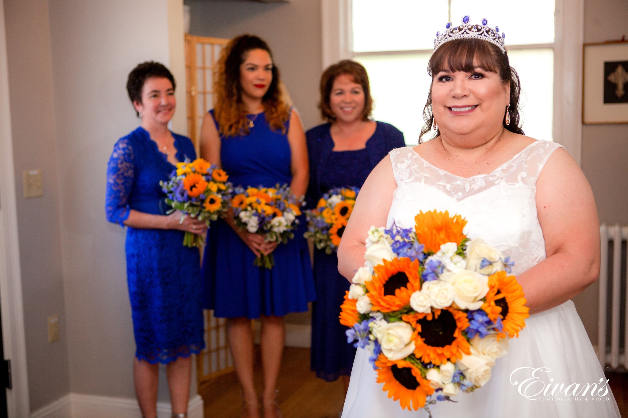 woman in white floral dress wearing eyeglasses