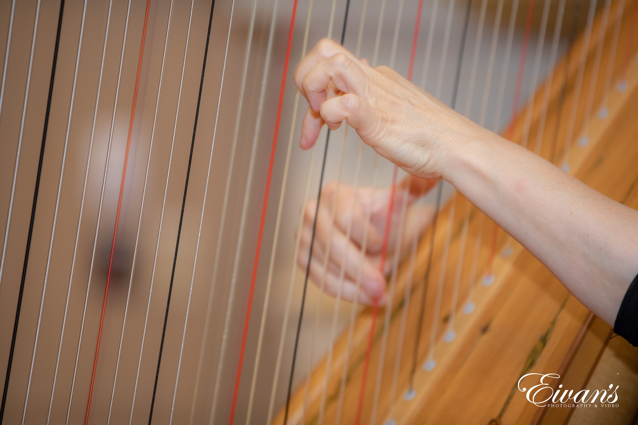 person playing brown wooden board