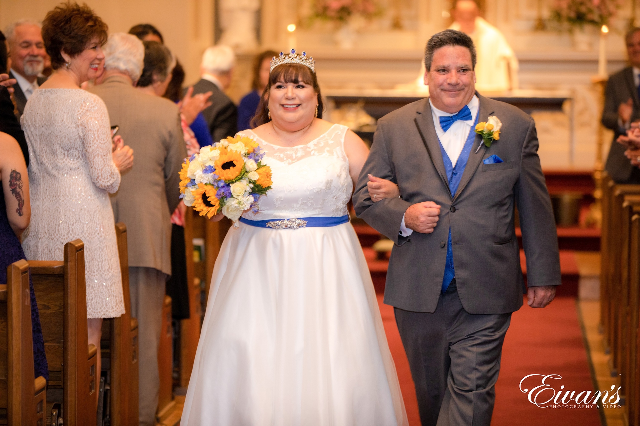 man in black suit jacket and woman in white wedding dress