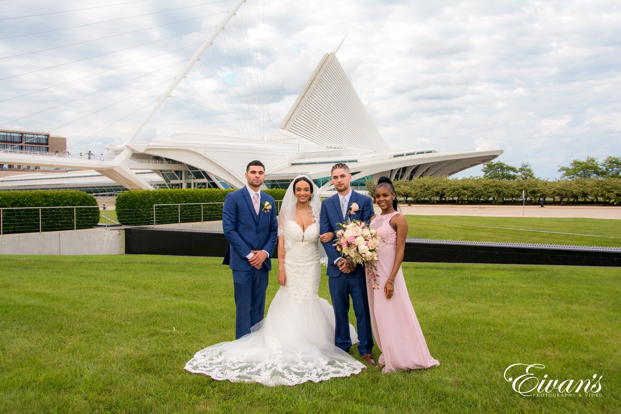 man and woman in wedding dress standing on green grass field during daytime
