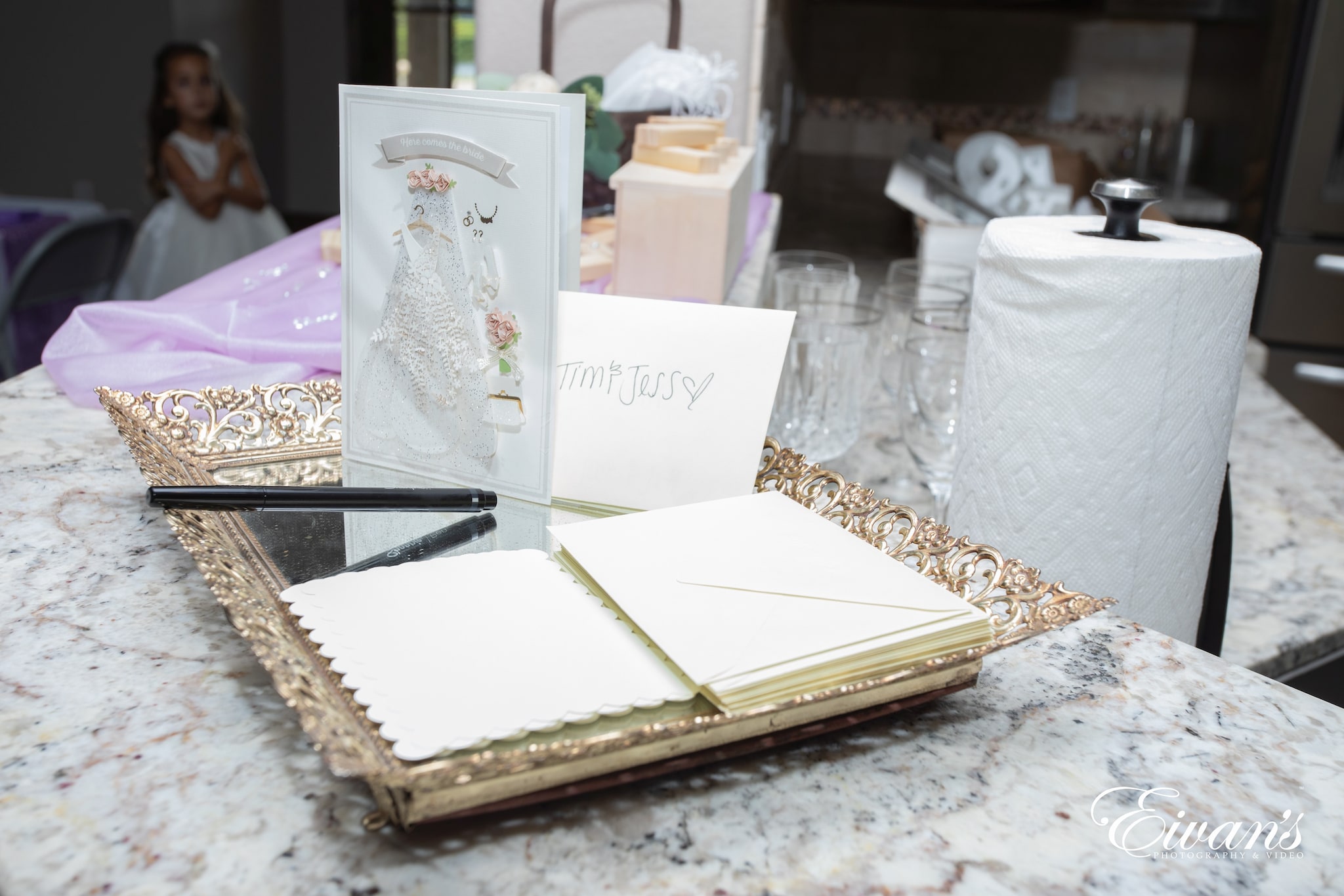 white and gold book on brown wooden table