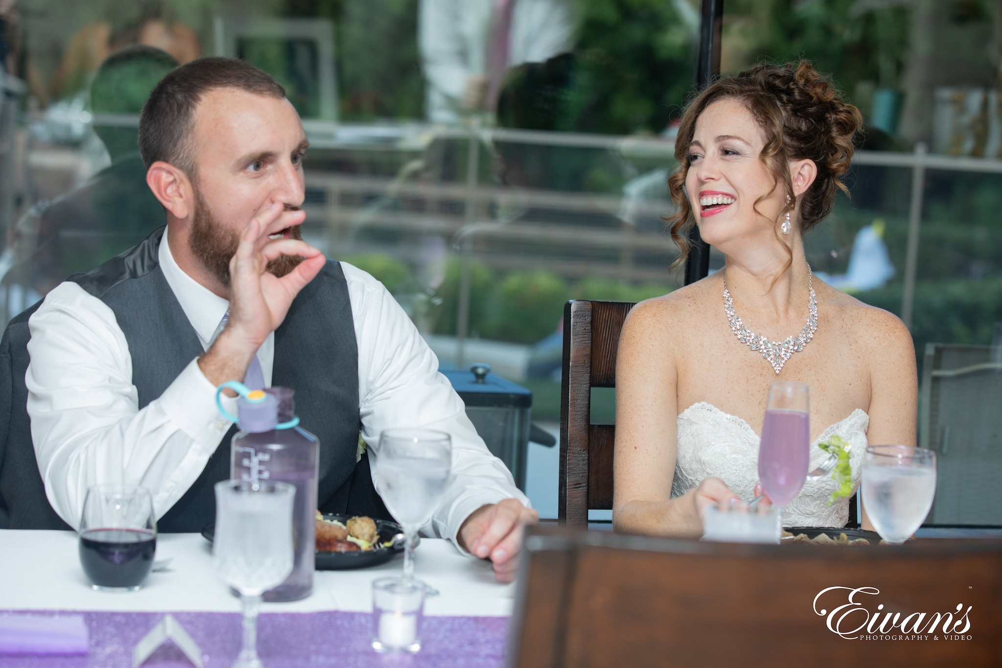 man and woman sitting at table
