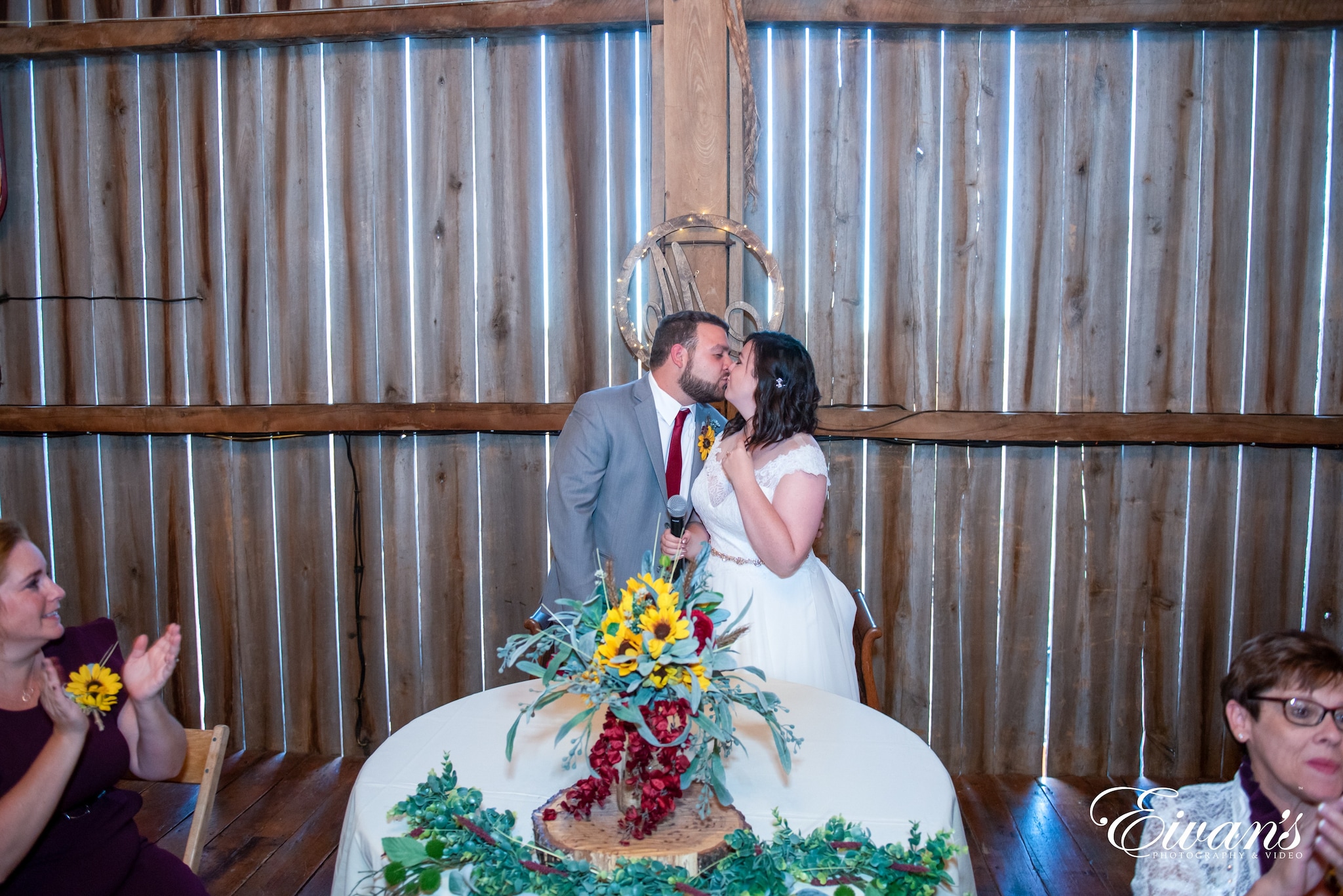 man in white dress shirt sitting on chair