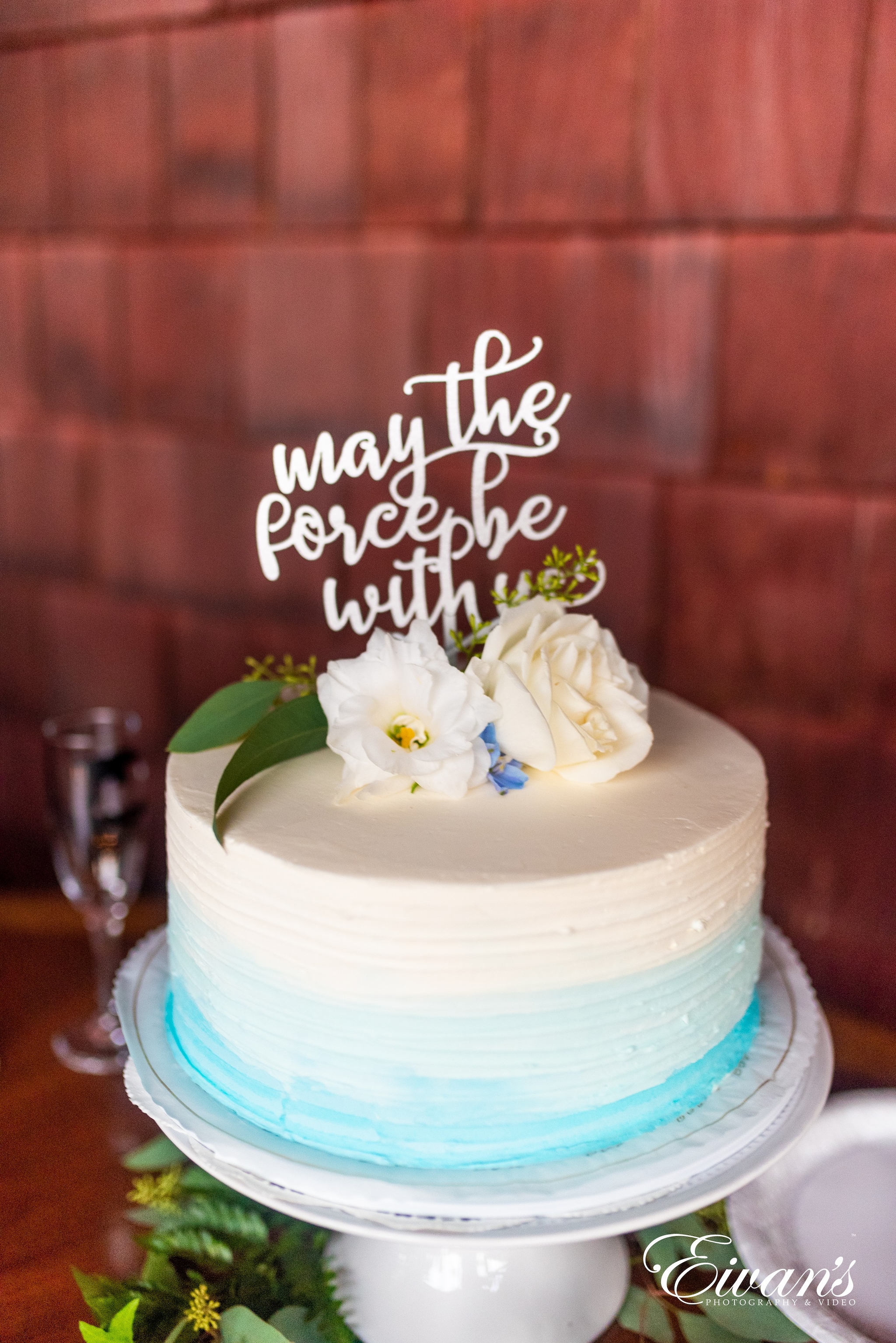 white rose on white cake