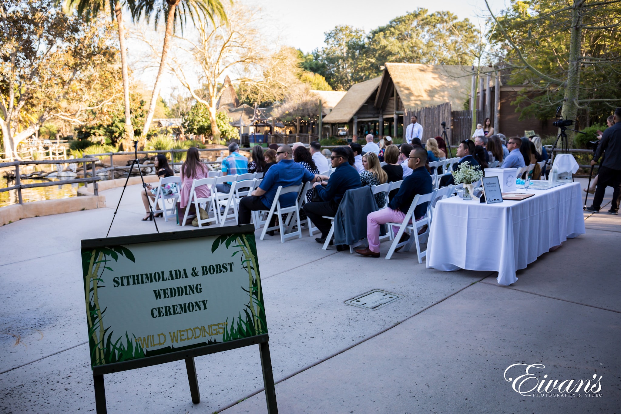 people sitting on white chairs during daytime