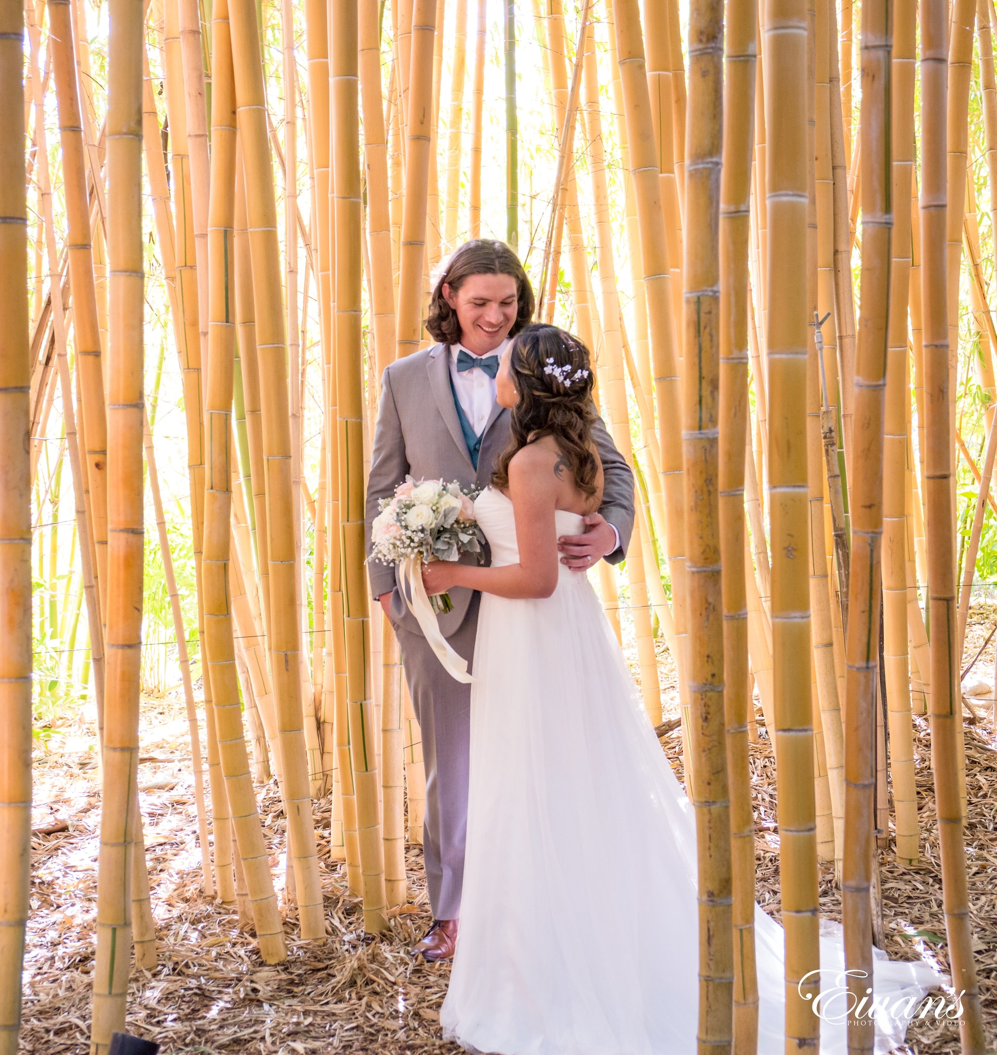 man and woman kissing on brown leaves