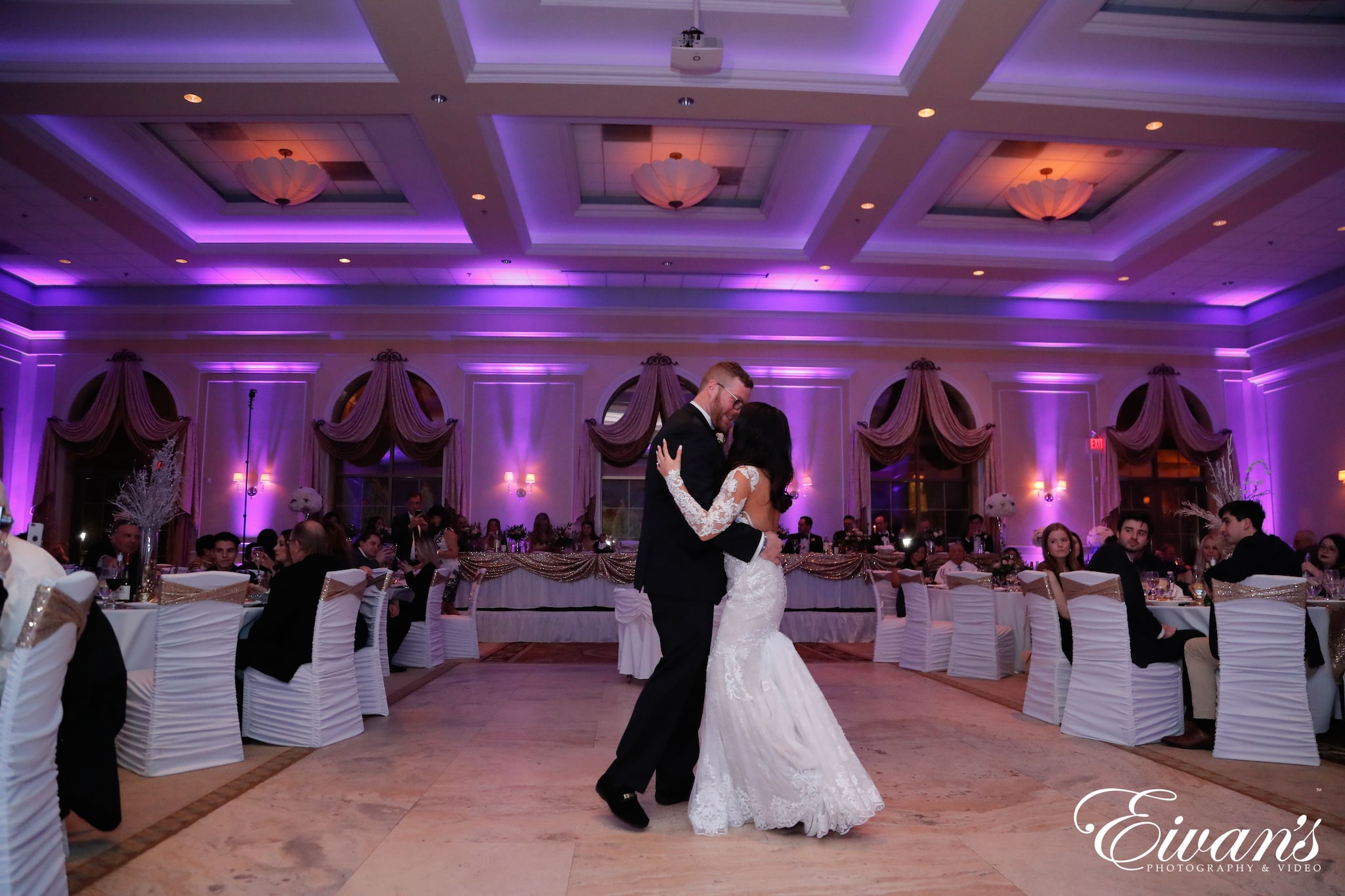 bride and groom dancing on stage