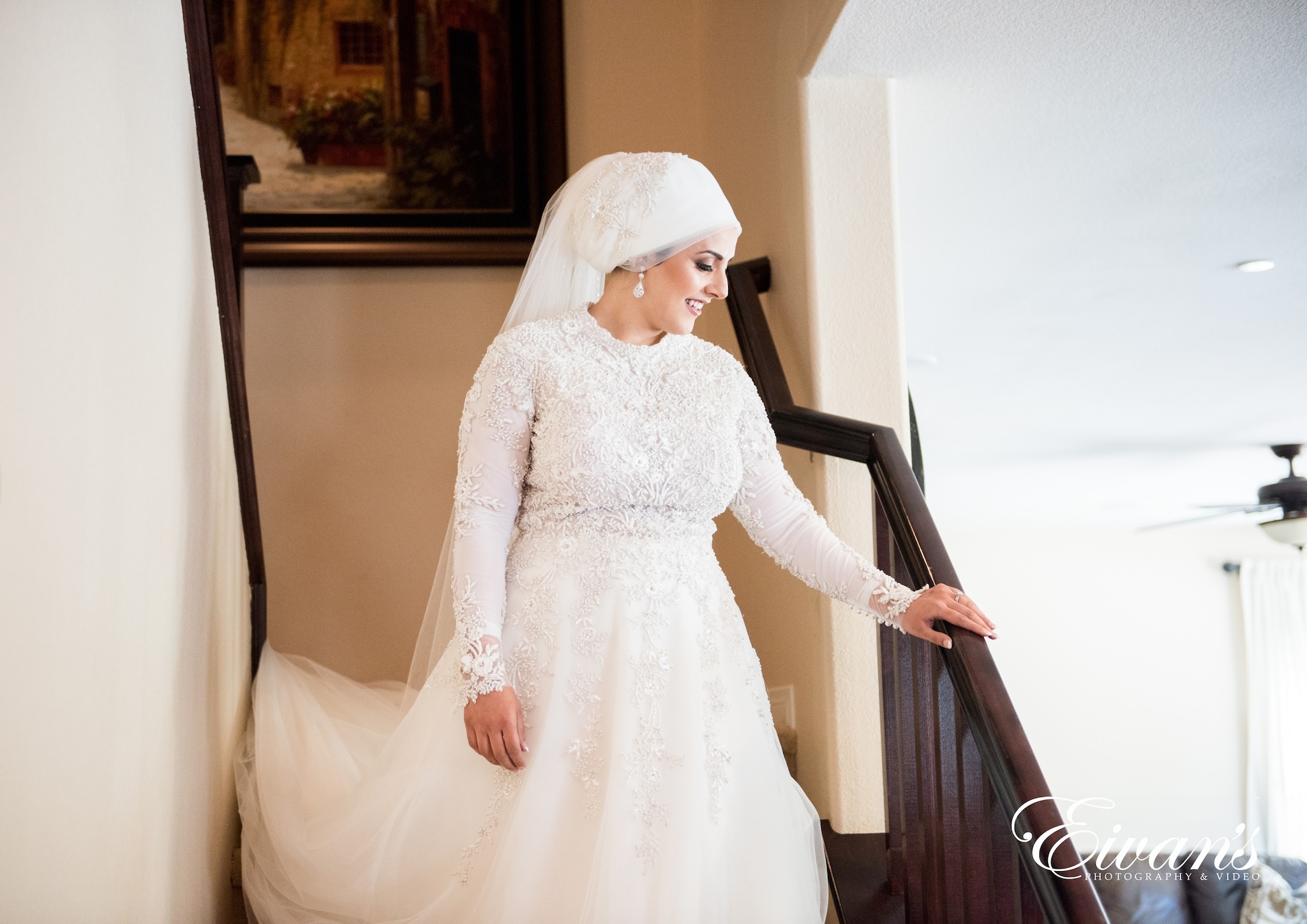 Beautiful islamic female model wearing hijab fashion, a modern wedding dress  for muslim woman walks along