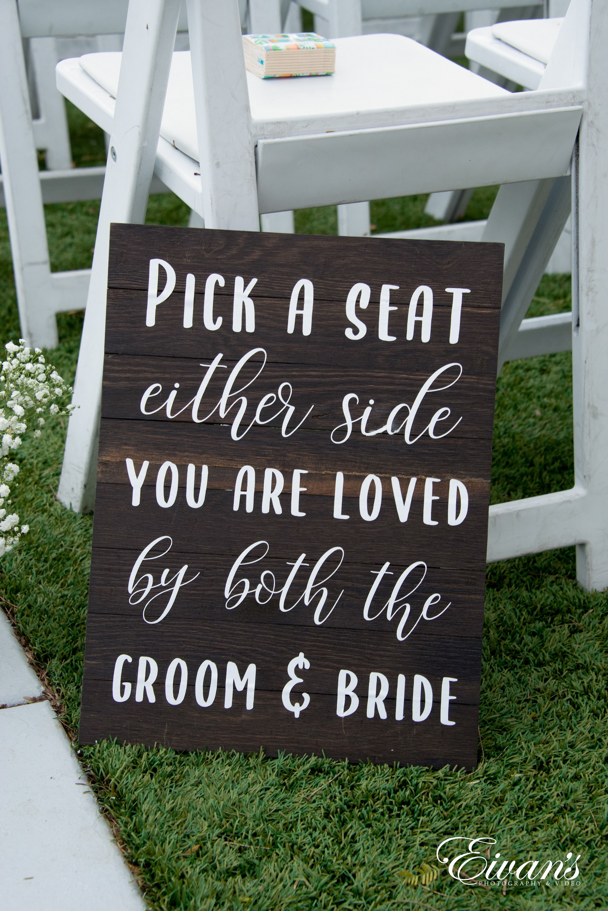 Pick A Seat Not A Side You're Loved by Groom And Bride Wooden Sign