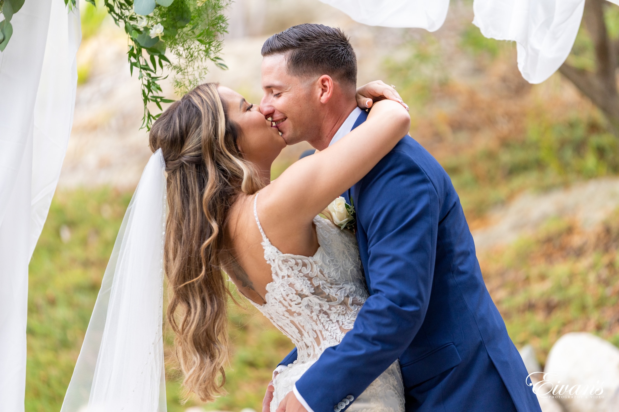 First Kiss Wedding Photos  Eivan's Photography & Video